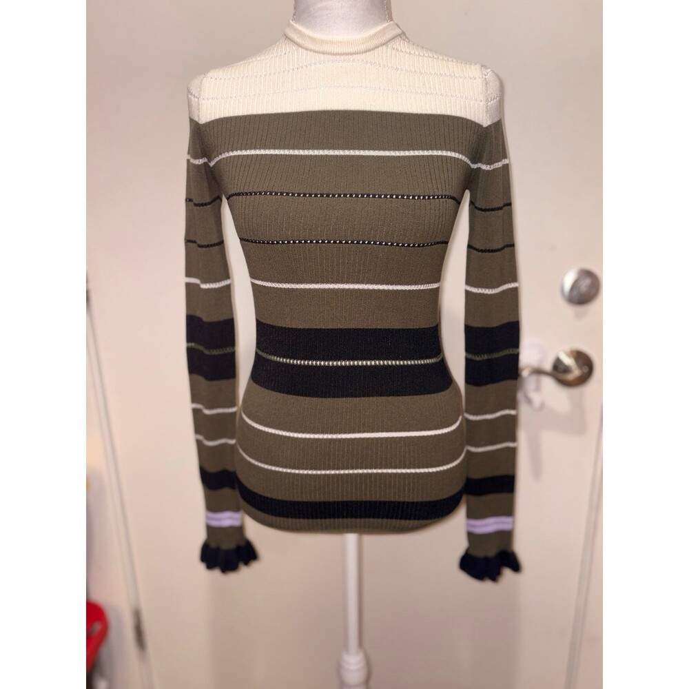 Opening ceremony sweater
Lightly‎ worn
Designer sweater
Size xs